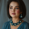 Woman wearing blue floral handmade choker necklace set with matching earrings and pearl detailing main