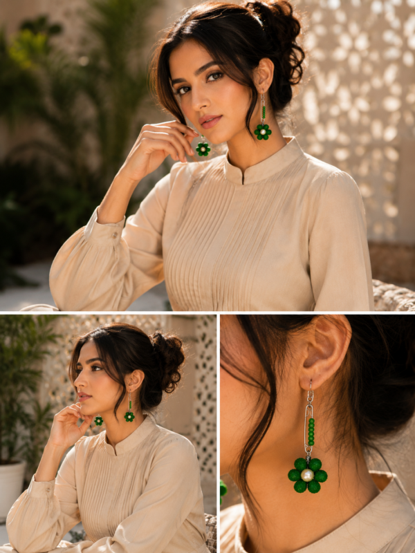 Woman wearing green safety pin earrings main