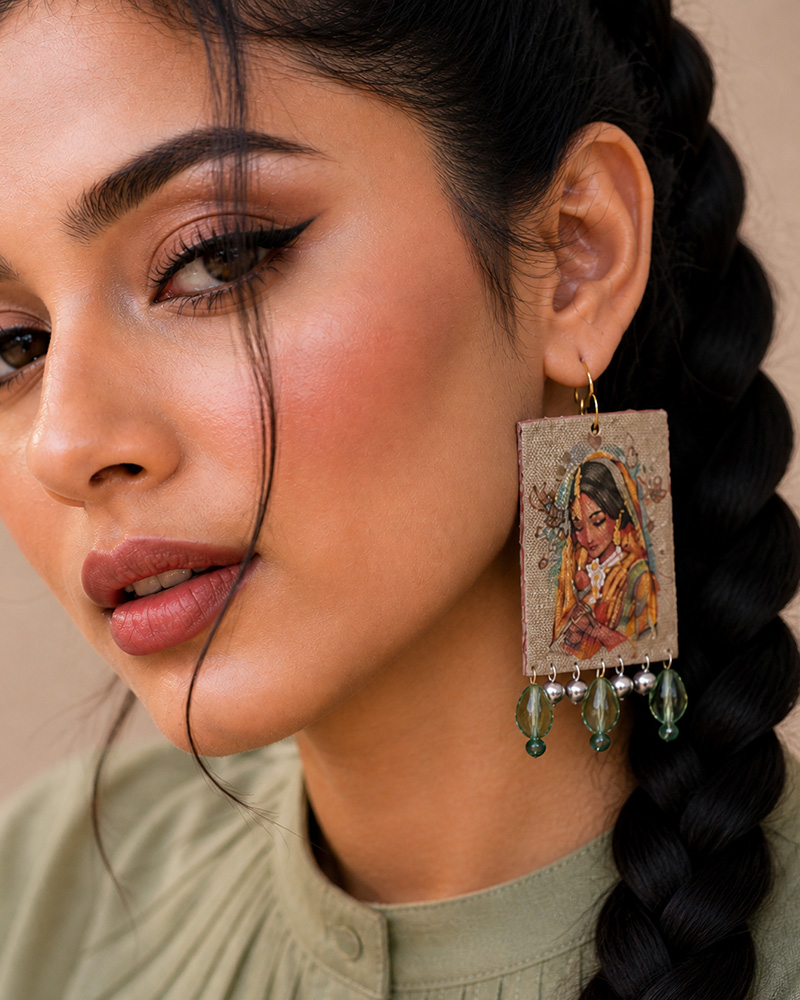 closeup of green handmade earrings for girls