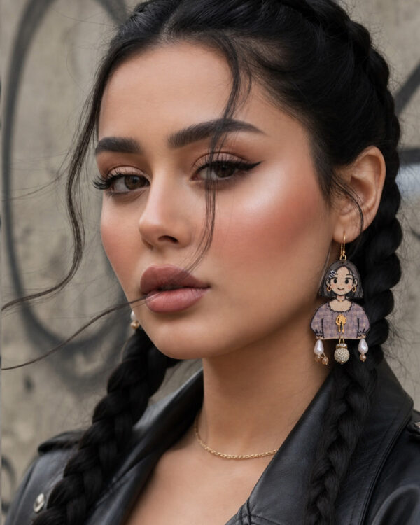 purple handmade doll earrings closeup