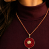 Handmade red chain pendant for women with braided thread design, gold-tone centerpiece