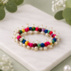 Handmade colorful pearl beaded bracelet with multicolor fabric beads and pearl accents for women by GALORIA.