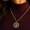 Handmade Initial Pendant Necklace featuring a floral embroidered letter S with a colorful braided cord